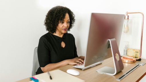 business woman sat at desk