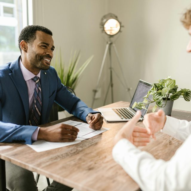 Insurer speaking with clients
